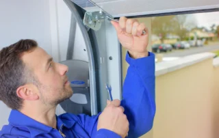 Professional garage door replacement being installed near Bristol, CT